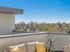 Scenic rooftop view showcases the city skyline and lush trees, creating a tranquil retreat at 4917 Lowell Blvd # 105, Denver, CO 80221