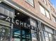 Modern storefront of Alchemy 365 with large windows and visible signage at 4917 Lowell Blvd # 105, Denver, CO 80221