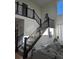 Inviting interior entryway showcases a staircase with dark rails and natural light at 6332 E 142Nd Pl, Thornton, CO 80602