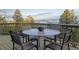 Deck with mountain views and outdoor seating, perfect for enjoying the scenery at 13452 Riley Peak Rd, Conifer, CO 80433