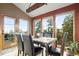 Dining room with outside views and an outdoor exit at 13452 Riley Peak Rd, Conifer, CO 80433