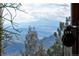 Breathtaking mountain view from a window at 13452 Riley Peak Rd, Conifer, CO 80433