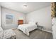 Cozy bedroom with natural light, carpet flooring, and closet at 3293 Offbeaten Pl, Castle Rock, CO 80108