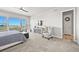 Spacious main bedroom boasting large windows with scenic views and comfortable seating at 3293 Offbeaten Pl, Castle Rock, CO 80108