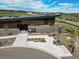 The community clubhouse, with modern design, ample parking, and well-maintained landscaping at 3293 Offbeaten Pl, Castle Rock, CO 80108