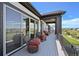 The deck features wicker seating and scenic views at 3293 Offbeaten Pl, Castle Rock, CO 80108