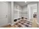 Mudroom offering built-in storage, bench seating and coat hooks at 3293 Offbeaten Pl, Castle Rock, CO 80108