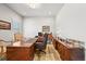 Home office with a classic wooden desk, chair, and ample space for productivity at 3293 Offbeaten Pl, Castle Rock, CO 80108