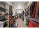 Well-organized walk-in closet with custom shelving and ample storage space at 3293 Offbeaten Pl, Castle Rock, CO 80108