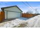 Detached garage with alley access and new door at 1673 Nome St, Aurora, CO 80010