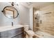 Modern bathroom features a sleek vanity, contemporary fixtures, and a glass-enclosed walk-in shower at 2162 Terraridge Dr, Highlands Ranch, CO 80126