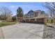 Charming two-story home with three car garage and well manicured lawn at 2162 Terraridge Dr, Highlands Ranch, CO 80126