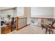 Spacious foyer with hardwood floors, iron railing, and a view of the living area at 2162 Terraridge Dr, Highlands Ranch, CO 80126