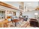 Inviting living room with hardwood floors, high ceilings, comfortable seating, and an open floor plan at 2162 Terraridge Dr, Highlands Ranch, CO 80126