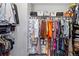 Walk-in closet with organized clothing racks and storage bins for optimal storage at 2511 Loon Ln, Castle Rock, CO 80104