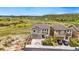 Attractive home with well-manicured landscaping, a driveway, and stunning natural views at 2511 Loon Ln, Castle Rock, CO 80104