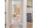 En suite bathroom offers a walk-in shower and separate soaking tub at 17020 E 107Th Ave, Commerce City, CO 80022