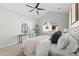Spacious bedroom with a ceiling fan, carpet, and serene ambiance at 22580 E Ontario Dr # 204, Aurora, CO 80016