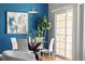 Bright and airy dining area with modern decor and a view to the outdoor space at 22580 E Ontario Dr # 204, Aurora, CO 80016