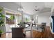 Bright and airy living space with hardwood floors, sliding glass doors, and a view of the outdoors at 22580 E Ontario Dr # 204, Aurora, CO 80016