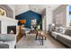 Inviting living room with modern furnishings, fireplace, and open layout, perfect for relaxing or entertaining guests at 22580 E Ontario Dr # 204, Aurora, CO 80016