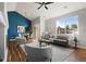 Bright living room features a neutral color palette, lots of natural light, and an open floor plan at 22580 E Ontario Dr # 204, Aurora, CO 80016