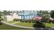 Great outdoor pool with water slide, lounge chairs, and well maintained grounds at 3295 N Coolidge Way, Aurora, CO 80019