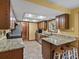 Well-lit kitchen featuring granite countertops and stainless steel appliances at 28272 Shadow Mountain Dr, Conifer, CO 80433