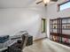 Home office with natural light and custom shelving at 28272 Shadow Mountain Dr, Conifer, CO 80433