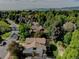 Lovely home with a backyard patio and mature trees at 8043 S Zephyr St, Littleton, CO 80128