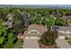 Beautiful aerial view of home, highlighting its lush landscaping and desirable neighborhood location at 8043 S Zephyr St, Littleton, CO 80128