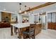 Beautiful kitchen with a wooden island, granite countertops, and stainless steel appliances at 8043 S Zephyr St, Littleton, CO 80128
