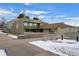 Exterior of building at Meadowood Neighborhood Center with prominent signage and accessible entrance at 16933 E Bethany Pl, Aurora, CO 80013