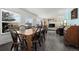 Inviting living room with large windows, hardwood floors, and ample seating at 16933 E Bethany Pl, Aurora, CO 80013