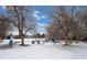Wide angle, snow covered, Gathering-friendly playground with structures for climbing, swinging, and sliding at 16933 E Bethany Pl, Aurora, CO 80013