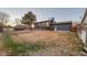 Large grassy backyard provides ample space for outdoor activities and relaxation at 18200 E Asbury Pl, Aurora, CO 80013