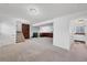 Expansive basement space with access to stairs and featuring a fireplace at 18200 E Asbury Pl, Aurora, CO 80013