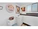 Charming bathroom with toilet, sink, mirror and decorative elements at 18200 E Asbury Pl, Aurora, CO 80013