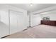 Bright bedroom featuring a spacious closet and neutral finishes at 18200 E Asbury Pl, Aurora, CO 80013