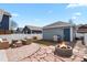 Backyard featuring a fire pit, patio seating, and grill is an ideal spot for relaxation and entertaining at 4540 Crestone Peak St, Brighton, CO 80601