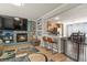 Open-concept layout with the living room flowing into the kitchen, creating a cohesive and social space at 4540 Crestone Peak St, Brighton, CO 80601