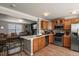 Open-concept kitchen and living room with views of the Gathering area at 4540 Crestone Peak St, Brighton, CO 80601