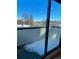 View from interior of a sunny balcony featuring wintery surroundings at 1258 Yates St, Denver, CO 80204