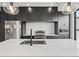 Bright kitchen featuring modern stainless steel appliances, and a large island with pendant lighting at 1258 Yates St, Denver, CO 80204