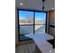 Contemporary kitchen showing bright quartz countertop island, large windows and view, and modern fixtures at 1258 Yates St, Denver, CO 80204