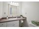 Bathroom featuring a framed mirror, single sink, and vanity at 20425 Flint Ln, Morrison, CO 80465