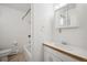 Bathroom featuring tub and shower combination and white sink and vanity at 20425 Flint Ln, Morrison, CO 80465