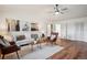 Spacious living room features modern decor, stylish furnishings, and ample natural light from windows at 20425 Flint Ln, Morrison, CO 80465