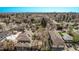Bird's eye view of houses featuring well-maintained lawns and mature trees within a quiet neighborhood at 451 Harrison St, Denver, CO 80206