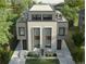 Modern duplex with clean lines, large windows, and stylish landscaping at 451 Harrison St, Denver, CO 80206